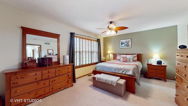2834 Shelly Ln, Aurora, IL 60504 - bedroom with light carpet, a ceiling fan, and baseboards