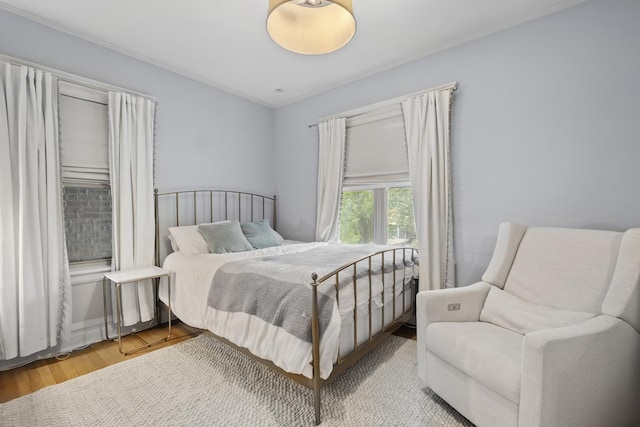 1419 W Birchwood Ave, Chicago, IL 60626 - bedroom with wood finished floors and ornamental molding