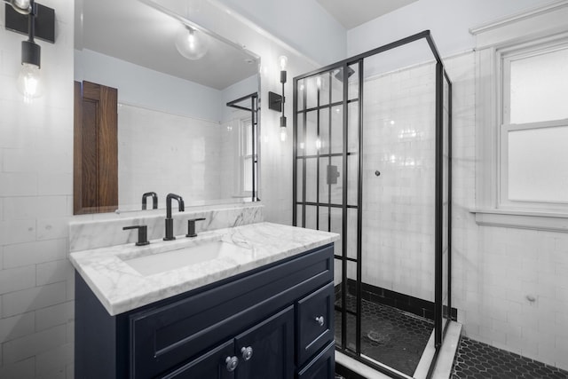 1419 W Birchwood Ave, Chicago, IL 60626 - bathroom featuring vanity, a stall shower, and tile walls