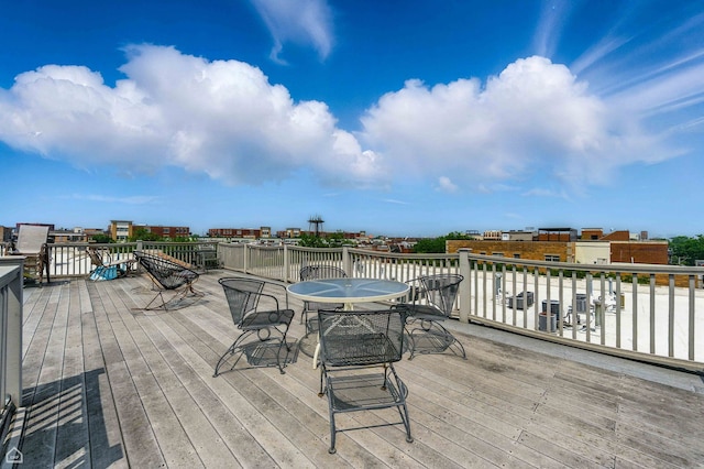 1670 N Claremont Ave Unit 109, Chicago, IL 60647 - wooden deck with outdoor dining space