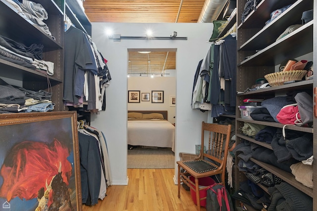 1670 N Claremont Ave Unit 109, Chicago, IL 60647 - walk in closet with wood finished floors