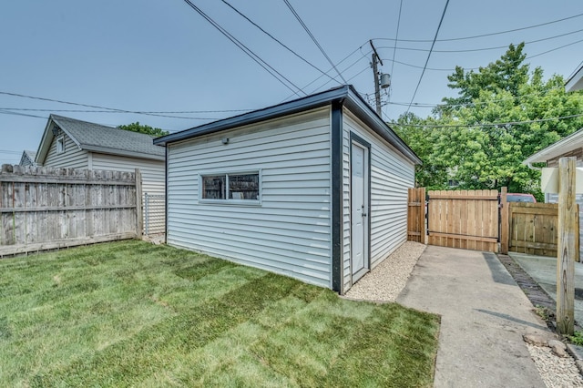 1132 Thomas Ave, Forest Park, IL 60130 - view of outdoor structure featuring a fenced backyard and a gate