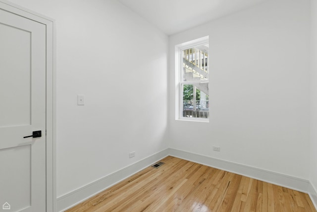 1928 W 21st St, Chicago, IL 60608 - empty room with light wood-style flooring and baseboards