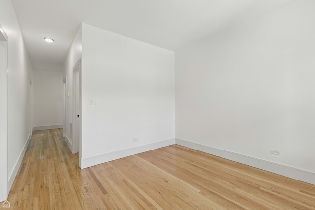 1928 W 21st St, Chicago, IL 60608 - empty room with light wood finished floors and baseboards