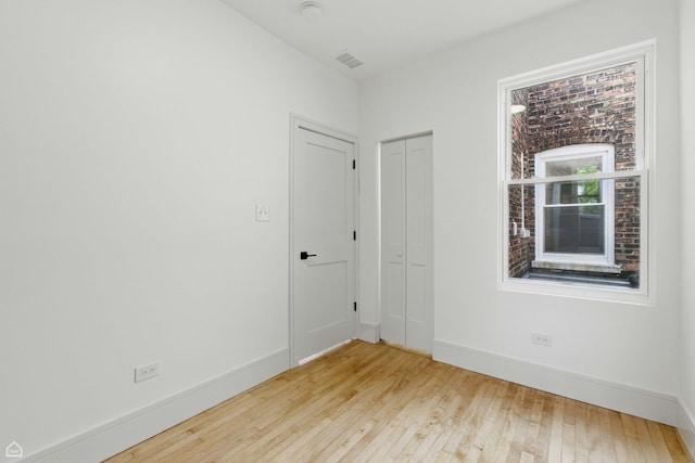 1928 W 21st St, Chicago, IL 60608 - unfurnished room with hardwood / wood-style flooring and baseboards