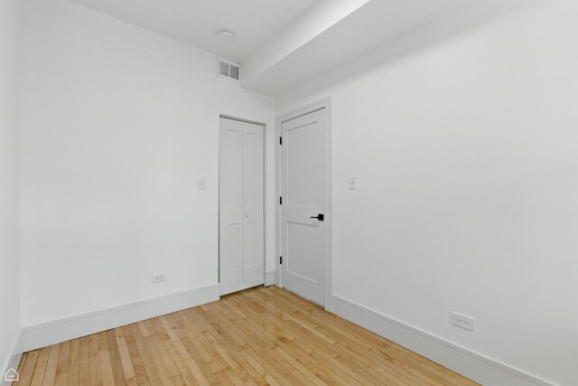 1928 W 21st St, Chicago, IL 60608 - empty room featuring wood-type flooring and baseboards