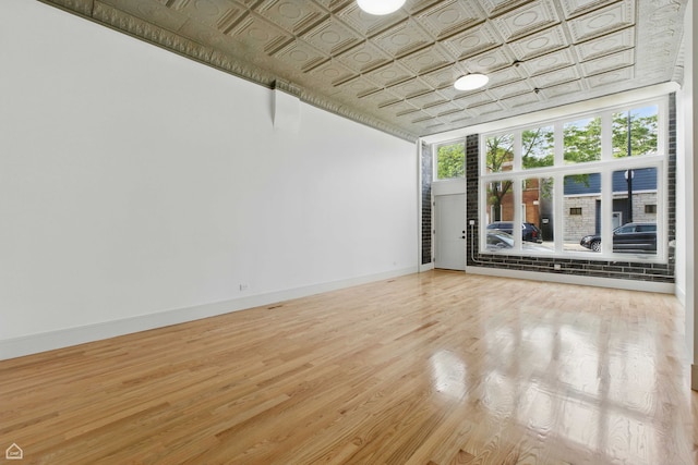 1928 W 21st St, Chicago, IL 60608 - unfurnished room with an ornate ceiling and light wood-type flooring