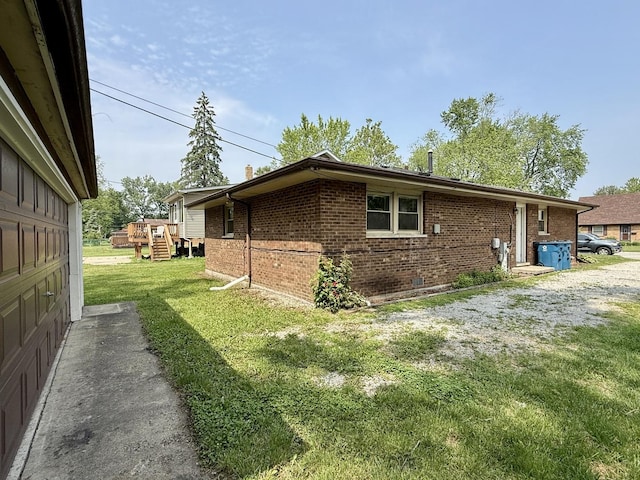 14334 Ridgeway Ave, Midlothian, IL 60445 - view of side of property featuring brick siding and a lawn