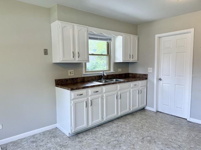 14334 Ridgeway Ave, Midlothian, IL 60445 - kitchen with a sink and white cabinets