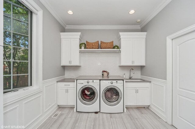 1219 Parkside Ln, Deerfield, IL 60015 - washroom with cabinet space, washer and clothes dryer, a decorative wall, wainscoting, and crown molding