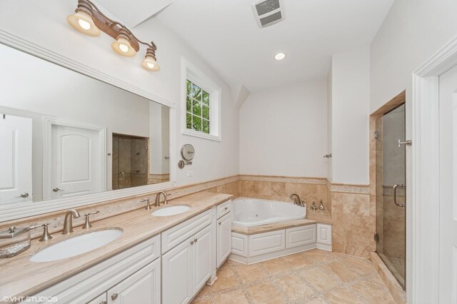1219 Parkside Ln, Deerfield, IL 60015 - bathroom with a shower stall, a garden tub, double vanity, and tile patterned flooring