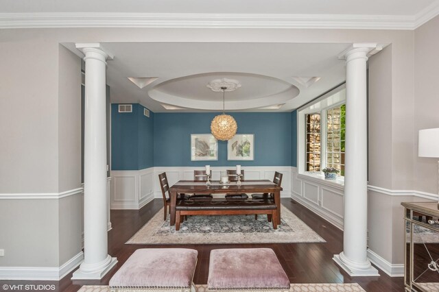 1219 Parkside Ln, Deerfield, IL 60015 - dining room with ornate columns, hardwood / wood-style flooring, a raised ceiling, and wainscoting