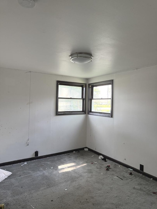 26048 S Dixie Hwy, Crete, IL 60417 - spare room with baseboards and carpet