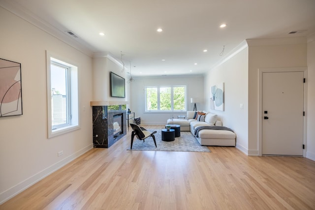 1016 N Hermitage Ave Unit 1, Chicago, IL 60622 - living room with ornamental molding, baseboards, a fireplace, light wood-style flooring, and recessed lighting