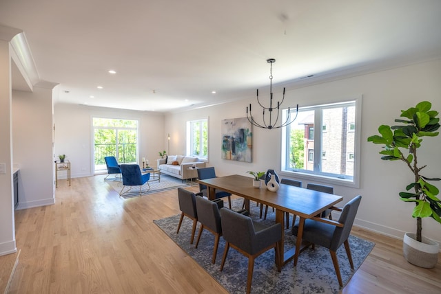 1016 N Hermitage Ave Unit 1, Chicago, IL 60622 - dining room featuring a chandelier, light wood finished floors, baseboards, recessed lighting, and ornamental molding