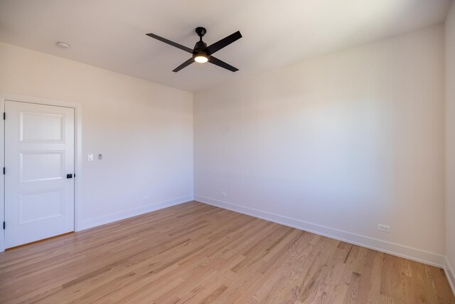 1016 N Hermitage Ave Unit 1, Chicago, IL 60622 - empty room with a ceiling fan, light wood-type flooring, and baseboards