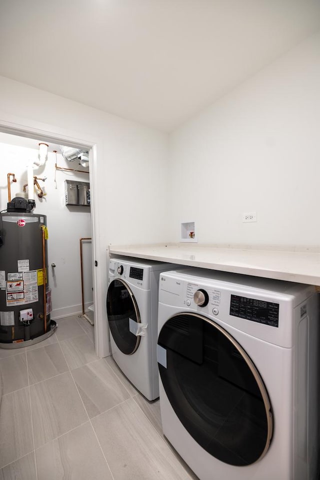 1016 N Hermitage Ave Unit 1, Chicago, IL 60622 - washroom with washer and dryer and water heater