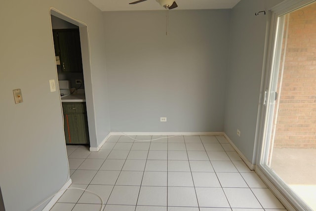 4410 W 111th St Unit 201, Oak Lawn, IL 60453 - empty room with ceiling fan, baseboards, and light tile patterned floors