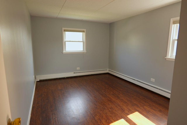 4410 W 111th St Unit 201, Oak Lawn, IL 60453 - spare room with a baseboard radiator, dark wood finished floors, and baseboards