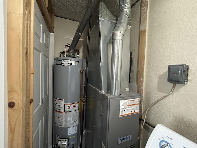 2100 Steven St, Rock Falls, IL 61071 - utility room with water heater and heating unit