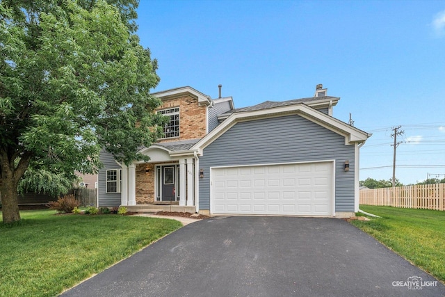 431 Blue Ridge Ct, Oswego, IL 60543 - traditional-style home with driveway, an attached garage, a chimney, and brick siding