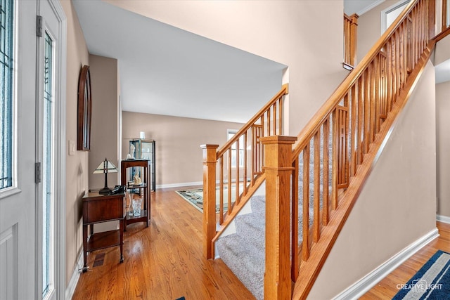 431 Blue Ridge Ct, Oswego, IL 60543 - entrance foyer featuring wood finished floors, healthy amount of natural light, and stairway