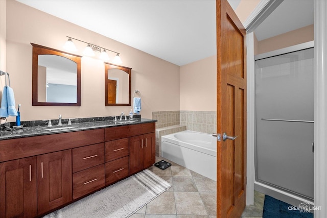 431 Blue Ridge Ct, Oswego, IL 60543 - bathroom featuring double vanity, tile patterned floors, and a garden tub