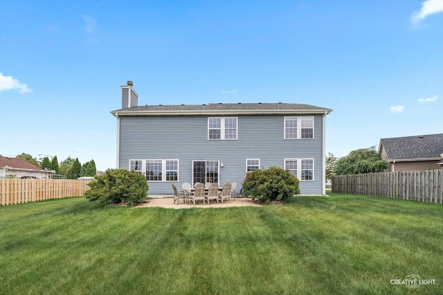 431 Blue Ridge Ct, Oswego, IL 60543 - rear view of property with a fenced backyard, a chimney, and a patio