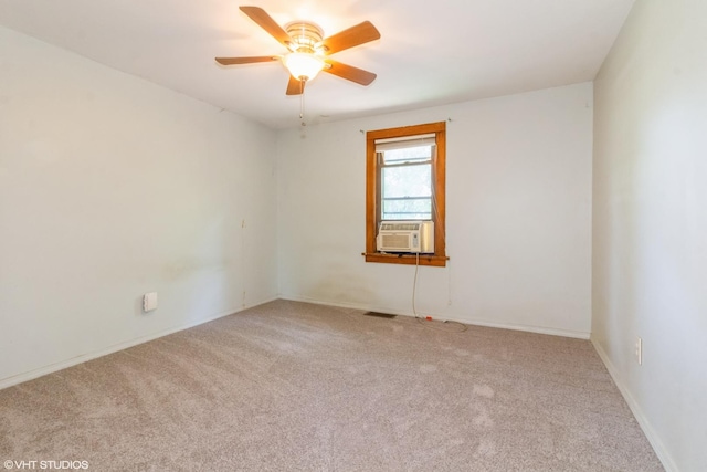509 Sherman Ave, Aurora, IL 60505 - empty room featuring carpet, ceiling fan, and cooling unit