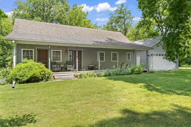 1046 N Riverside Dr, Momence, IL 60954 - view of front of property featuring a front lawn, a garage, a porch, and a shingled roof