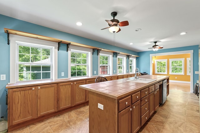 1046 N Riverside Dr, Momence, IL 60954 - kitchen with tile counters, ceiling fan, recessed lighting, and healthy amount of natural light
