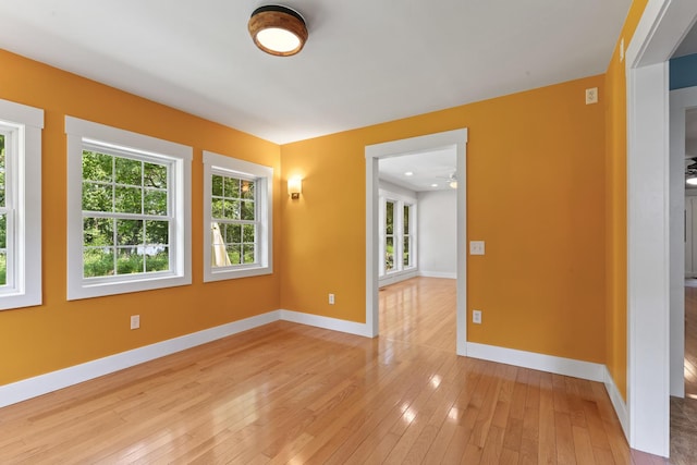 1046 N Riverside Dr, Momence, IL 60954 - empty room featuring light wood-style floors and baseboards