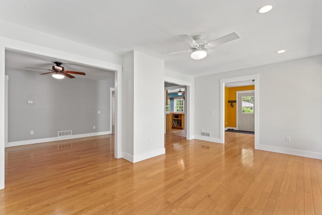 1046 N Riverside Dr, Momence, IL 60954 - unfurnished room featuring ceiling fan, light wood finished floors, and recessed lighting