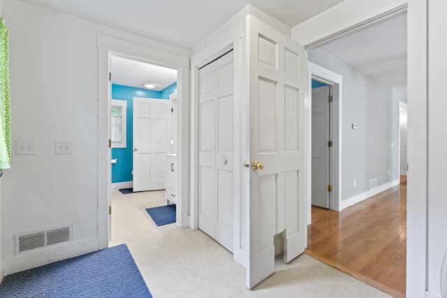 1046 N Riverside Dr, Momence, IL 60954 - corridor with baseboards and wood finished floors