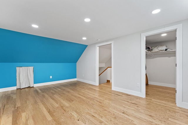 1046 N Riverside Dr, Momence, IL 60954 - additional living space featuring wood finished floors, recessed lighting, and vaulted ceiling