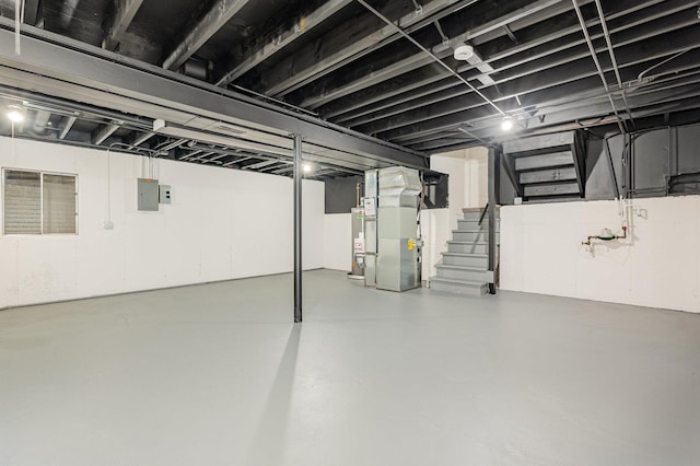 1500 Bunescu Ln, Buffalo Grove, IL 60089 - basement featuring stairs, heating unit, water heater, and electric panel