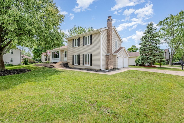1500 Bunescu Ln, Buffalo Grove, IL 60089 - view of front of house featuring driveway, a chimney, a front yard, and an attached garage