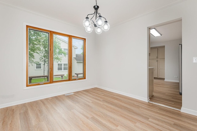 1500 Bunescu Ln, Buffalo Grove, IL 60089 - empty room with light wood-type flooring, baseboards, a chandelier, and crown molding