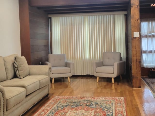 4930 S Luna Ave, Chicago, IL 60638 - living room with wood finished floors and wood walls