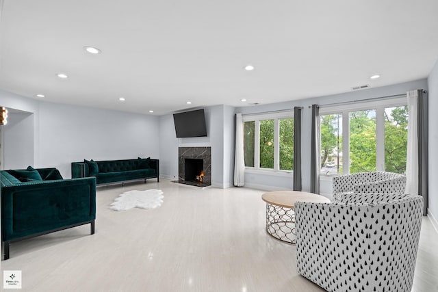 50 Lake Blvd Unit 632, Buffalo Grove, IL 60089 - living room featuring wood finished floors, a fireplace, baseboards, and recessed lighting