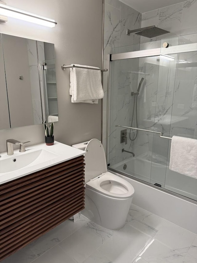 11 S Roberts Rd, Inverness, IL 60067 - bathroom with bath / shower combo with glass door, vanity, marble finish floors, and toilet