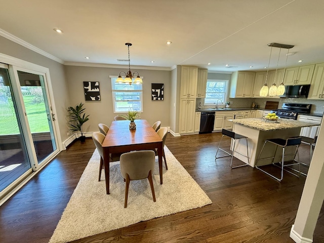 11 S Roberts Rd, Inverness, IL 60067 - dining area featuring recessed lighting, dark wood-style flooring, baseboards, crown molding, and a chandelier