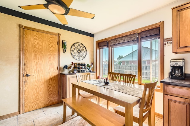 9001 Mobile Ave, Oak Lawn, IL 60453 - dining room featuring a ceiling fan and light tile patterned floors