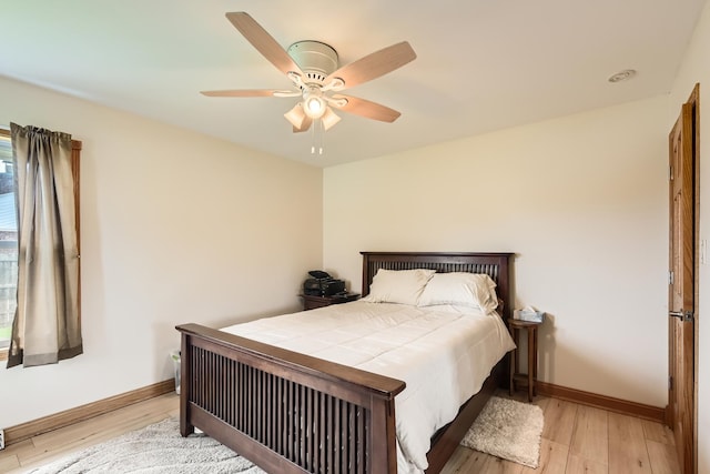 9001 Mobile Ave, Oak Lawn, IL 60453 - bedroom featuring light wood-style floors and a ceiling fan