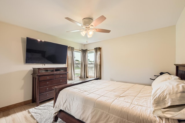 9001 Mobile Ave, Oak Lawn, IL 60453 - bedroom featuring light wood finished floors and a ceiling fan