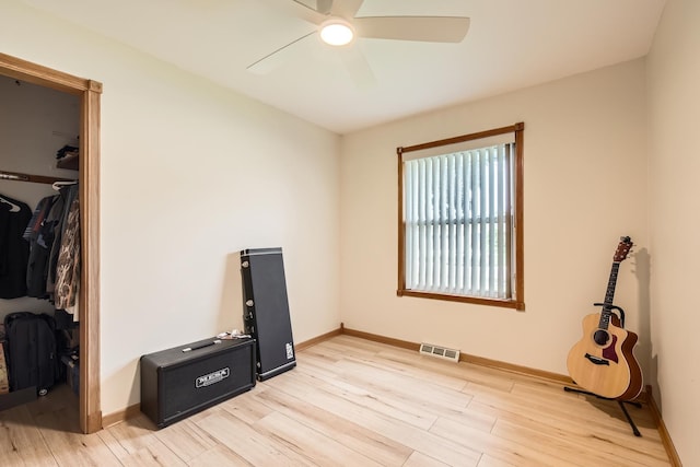 9001 Mobile Ave, Oak Lawn, IL 60453 - unfurnished bedroom with light wood-style floors, a closet, and ceiling fan