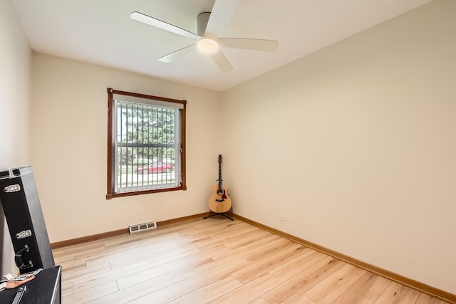 9001 Mobile Ave, Oak Lawn, IL 60453 - unfurnished room with light wood-style floors and a ceiling fan