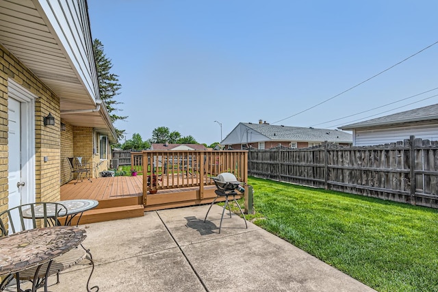 9001 Mobile Ave, Oak Lawn, IL 60453 - fenced backyard with a deck and a patio area