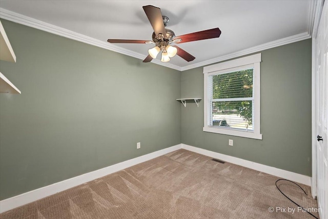 5502 Thelen Ave, Mchenry, IL 60050 - carpeted empty room featuring crown molding and ceiling fan