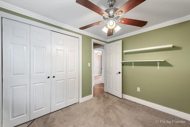 5502 Thelen Ave, Mchenry, IL 60050 - unfurnished bedroom featuring light carpet, ornamental molding, a closet, and ceiling fan